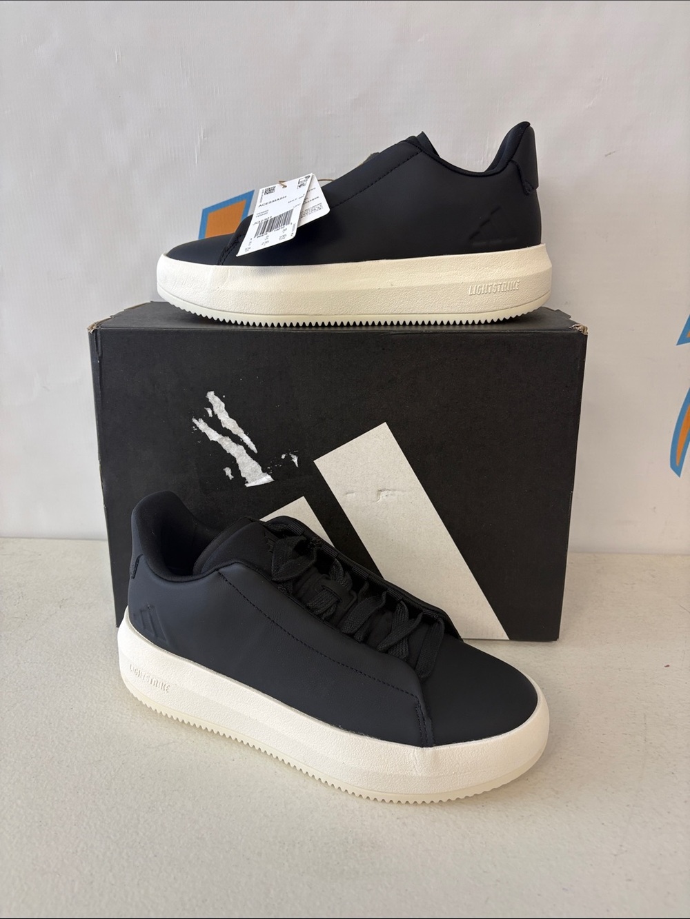 adidas Black Low-Top Sneakers with White Sole
